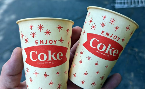 Paper cup advertising of Cocacola
